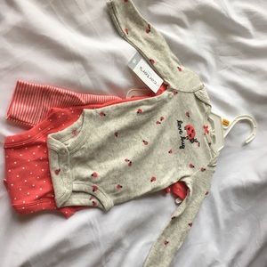 Newborn onesies and pants by Cater’s